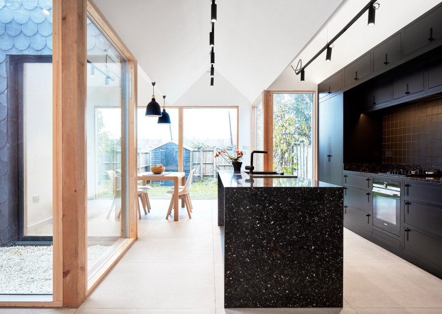 House With 2 Courtyards and 3 Pitched Roofs